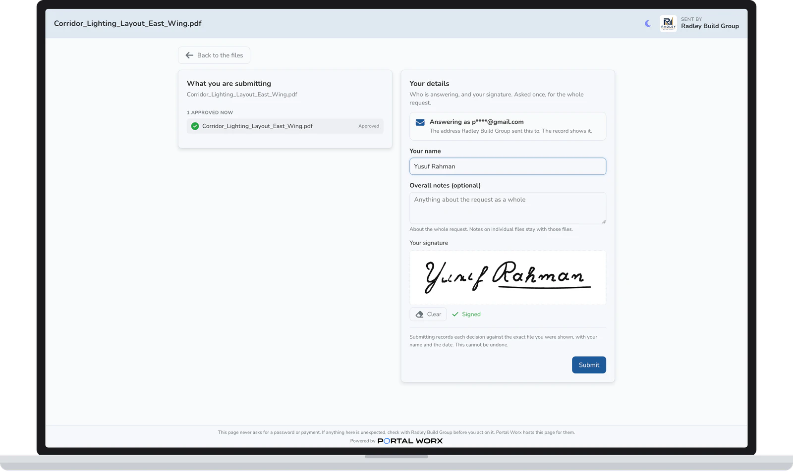 The signing step on a laptop: the name typed and the signature drawn